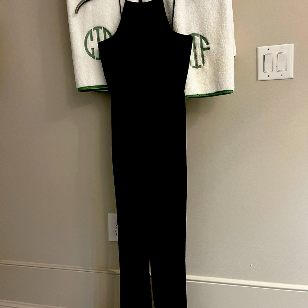 Black Halo Jumpsuit, looks new, barely worn, I know longer can it this size